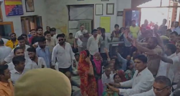 sit-protest-police-station